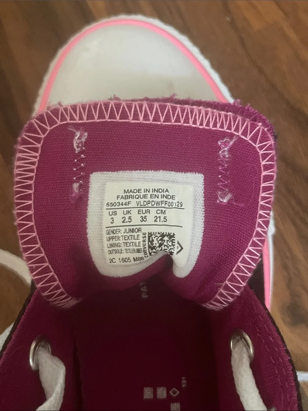 Converse Low-Top Canvas Sneakers in Black and Magenta Pink